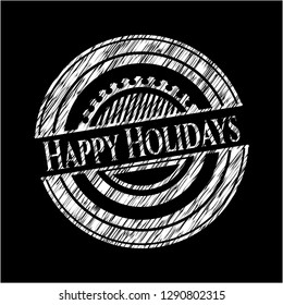 Happy Holidays written on a chalkboard