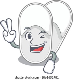 Happy hotel slippers cartoon design concept show two fingers