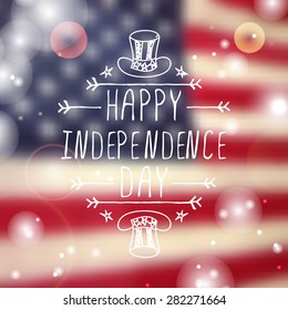 Happy Independence day card with hat and handlettering element on blurred  background. Happy Independence Day 