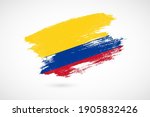 Happy independence day of Colombia with vintage style brush flag background