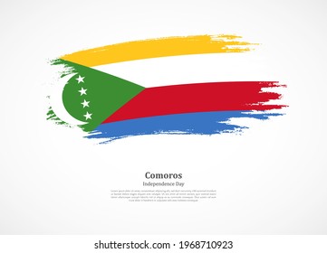 Happy independence day of Comoros with national flag on grunge texture