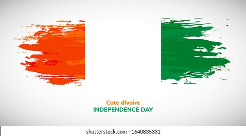 Happy independence day of Cote dIvoire. Brush flag of Cote dIvoire vector illustration. Abstract watercolor concept of national brush flag background. Brush stroke background.