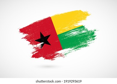 Happy independence day of Guinea-Bissau with vintage style brush flag background