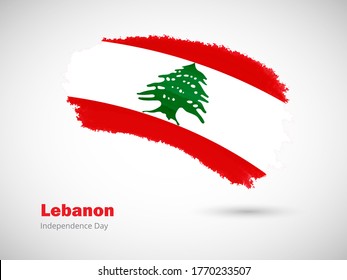 Happy independence day of Lebanon with artistic watercolor country flag background. Grunge brush flag illustration