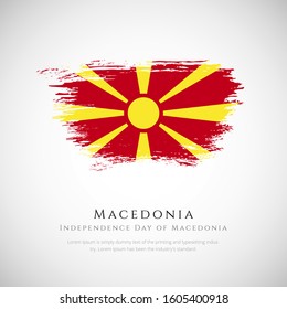 Happy independence day of Macedonia. brush flag of Macedonia vector illustration. abstract concept of national brush flag background. brush stroke background.