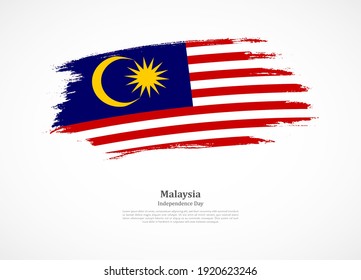 Happy independence day of Malaysia with national flag on grunge texture