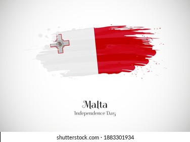 Feliz día de la independencia de Malta con un creativo fondo de bandera de brocha