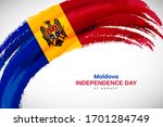 Happy independence day of Moldova. Watercolor brush stroke flag background. Modern national country flag with Abstract watercolor grunge brush flag.