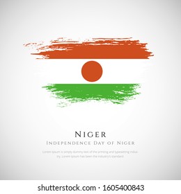 Happy independence day of Niger. brush flag of Niger vector illustration. abstract concept of national brush flag background. brush stroke background.