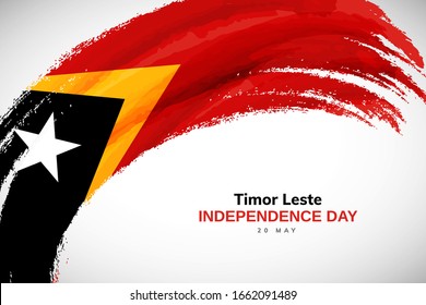 Happy Independence day of Timor Leste. Watercolor brush stroke flag background. Classic national country flag with Abstract watercolor grunge brush flag.