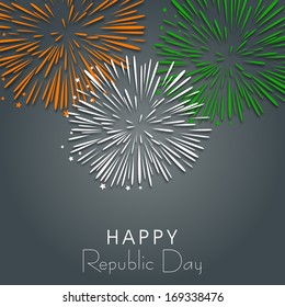 Happy Indian Republic Day concept with beautiful fireworks in national flag colors on grey background. 