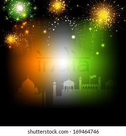 Happy Indian Republic Day concept with national flag colors with shiny fireworks on abstract background. 