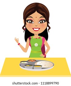 Happy Indian woman in an apron has just made wholesome Indian food