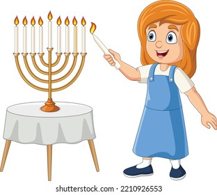 Happy jewish girl lights hanukkah candles