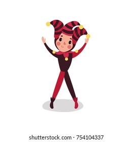 Happy joker cartoon character performing with hands up. Boy in black and red costume. Jester or festival fool wear with cap and bells. Comedy artist in circus show. Flat vector isolated on white.