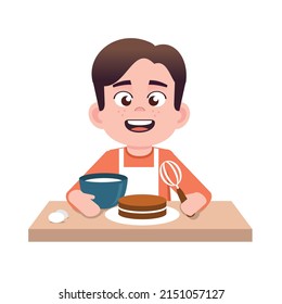 happy kid boy cooking a birthday cake