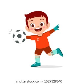 Happy Kid Boy Play Soccer As Goalkeeper