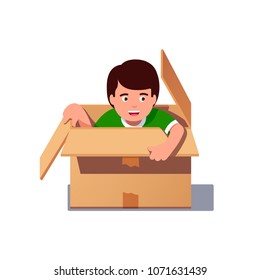 Happy kid hiding in a cardboard box. Glad boy playing hide and seek. Flat style isolated vector illustration