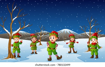 Happy kid wearing elf costume in the snowing hill