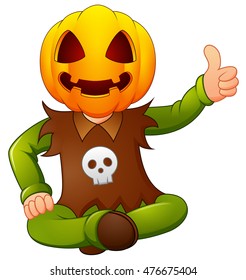 Happy kid wearing pumpkin mask giving thumb up