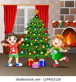 Happy kids celebrating christmas in the house