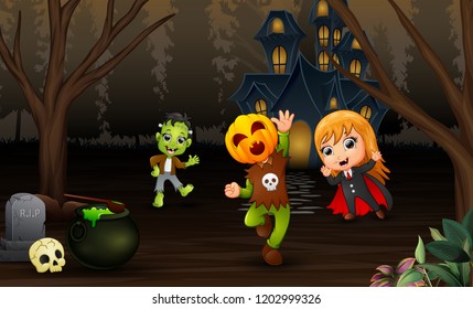 Happy kids celebration halloween day with haunted house background