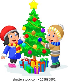 Happy kids decorating a Christmas tree with balls