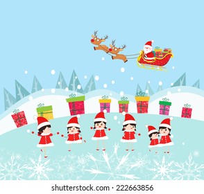 Happy Kids Decorating santa claus With gifts