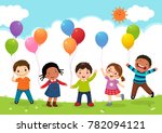 Happy kids jumping together and holding balloons