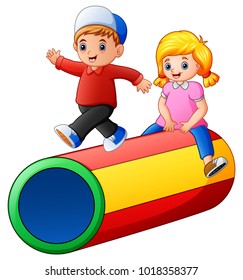 Happy kids playing on the tunnel