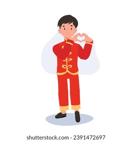Happy kids in Red Chinese traditional Costume Making Hand Heart Shape Gesture