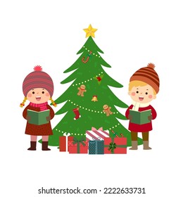 Happy kids singing Christmas Carols with Christmas tree