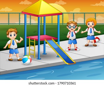 Happy kids in a swimming pool
