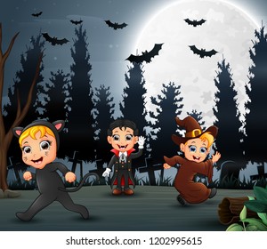 Happy kids wearing halloween costume in the night
