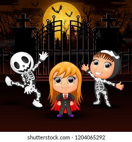 Happy kids wearing halloween costume outdoors at night