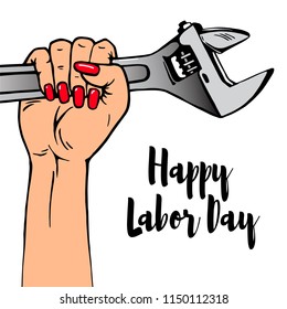 Happy Labor Day lettering. Cartoon female hand with manicure holds adjustable wrench. Typography vector design for Labor day greeting cards and poster. Design template celebration. Vector illustration