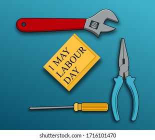 Happy labor day poster or banner design. 1 May International Labor Day. With illustrations of pliers, wrenches and yellow screwdrivers.