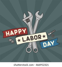 Happy labor day! Tape with the inscription encircle two wrench.