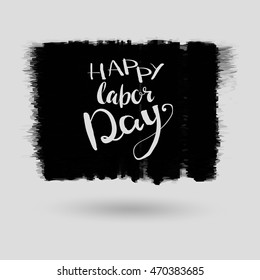 Happy Labor day typographic monochrome design. Usable as letter banner, cards,badge,label, posters. Hand Lettering on grunge ink background. Black abstract decoration with text. Vector illustration.