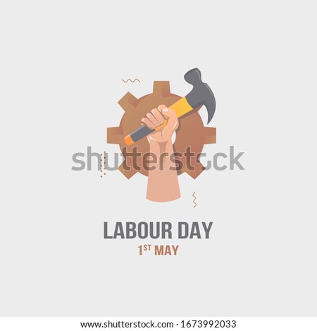 Happy labour day with flat design of hand with holding a hammer