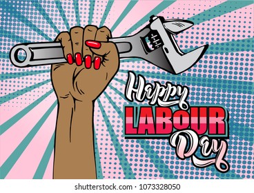 Happy Labour Day lettering. Cartoon female hand with manicure holds adjustable wrench. Typography vector design for greeting cards and poster. Design template celebration. Vector illustration.