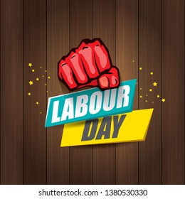 Happy labour day vector label with strong orange fist in the air on wooden background. vector happy labor day background or banner with man hand. workers may day poster