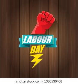 Happy labour day vector label with strong orange fist in the air on wooden background. vector happy labor day background or banner with man hand. workers may day poster