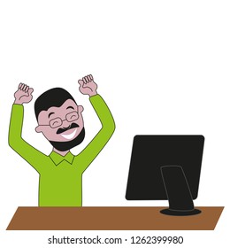 Happy and laughing bearded man with glasses in front of a computer monitor.