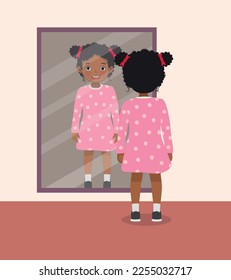 happy little African girl standing in front of mirror looking her reflection with new pink dress