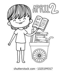 happy little boy with cart of books