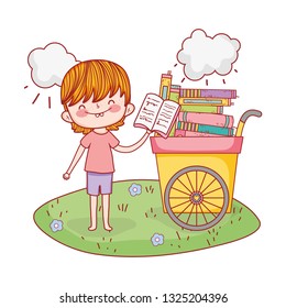 happy little boy with cart of books in the field