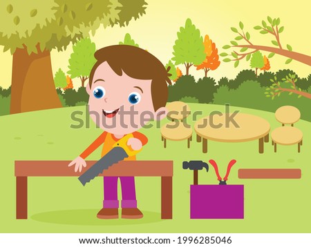 Happy little boy playing as carpenter while sawing a plank