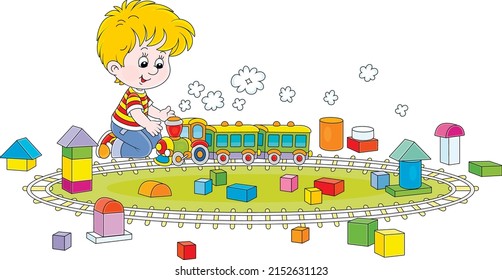 Happy little boy playing with a toy railway train and cubes of different shapes and colors in a playroom, vector cartoon illustration on a white background