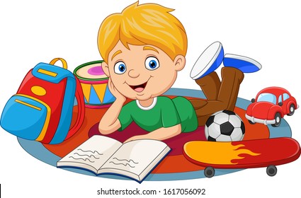 Happy little boy playing with toys